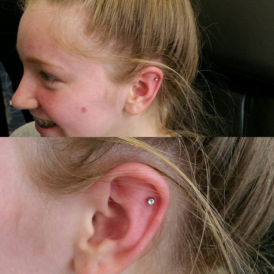 Flat / Helix Cartilage piercing in Cardiff with industrial strength.jpg